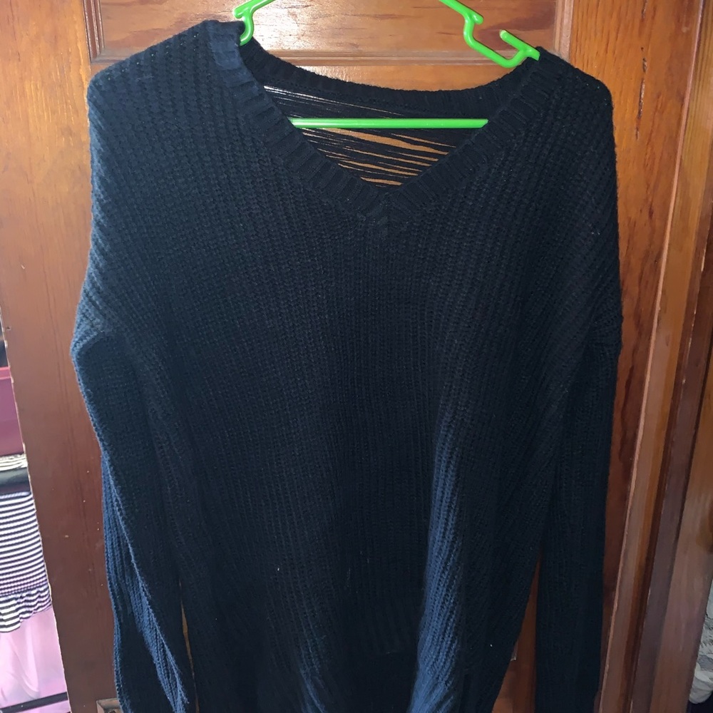 Black sweater with see through back